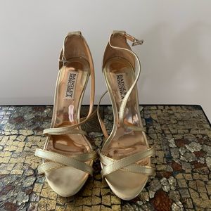 Badgley Mischka gold strappy heels.